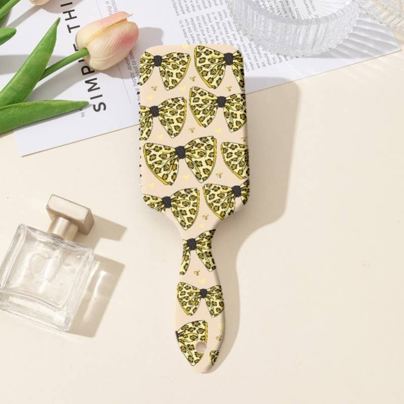 JOSSLYN by wall to wall - LARGE DETANGLE PADDLE HAIR BRUSH COMB | 40HC100: BOW B