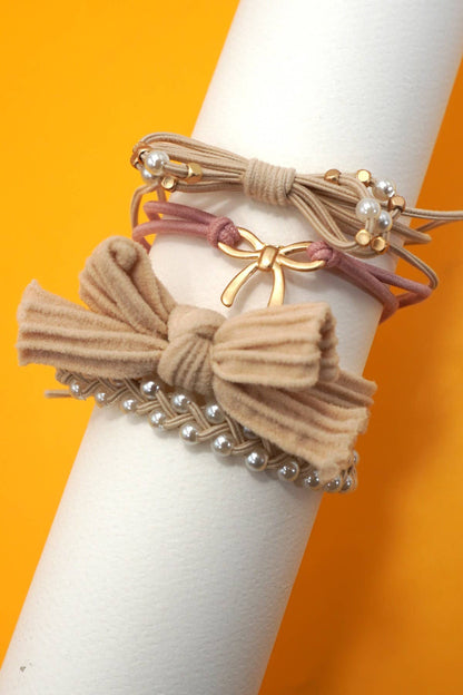 Ivory - JOSSLYN by wall to wall - BOHO DUAL FUNCTION KNOT BRACELET HAIR TIES