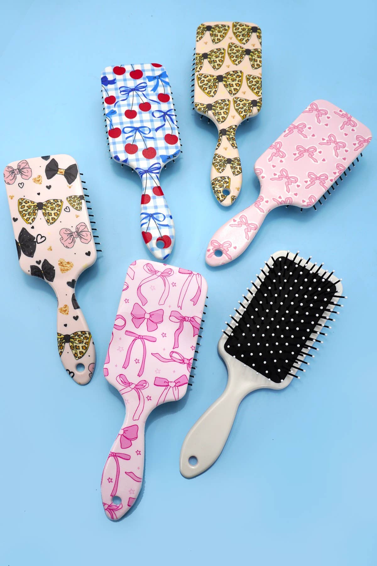 JOSSLYN by wall to wall - LARGE DETANGLE PADDLE HAIR BRUSH COMB | 40HC100: BOW B